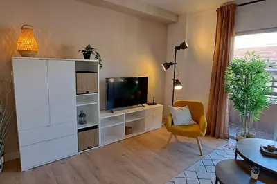 Una televisión o centro de entretenimiento en Piso acogedor en los Pirineos