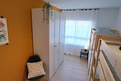 Cama o camas de una habitación en Piso acogedor en los Pirineos