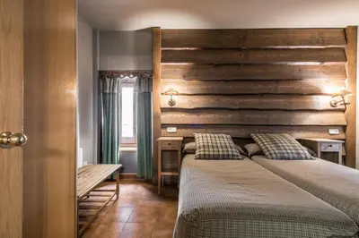 Cama o camas de una habitación en Riu Nere Mountain Apartments