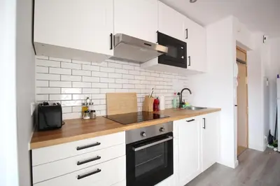 Una cocina o zona de cocina en Cómodo piso en el Pirineo Aragonés