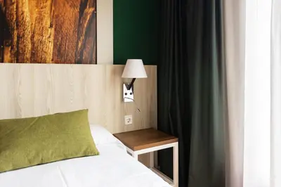 Cama o camas de una habitación en Gran Hotel de Jaca