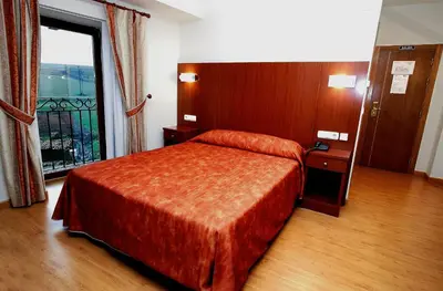 Cama o camas de una habitación en Hotel Agorreta