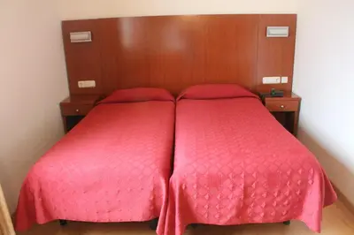 Cama o camas de una habitación en Hotel Agorreta