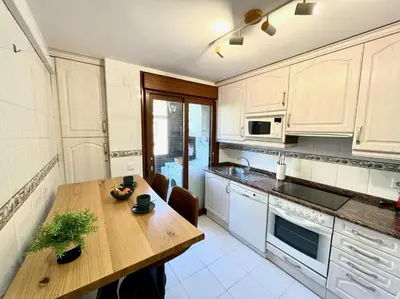Una cocina o zona de cocina en Tenor Apartamento inc Parking