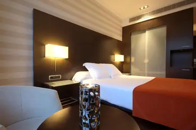Cama o camas de una habitación en Hotel Zenit Pamplona