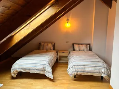 Cama o camas de una habitación en Tu dúplex luminoso con vistas y confort - Erta 12