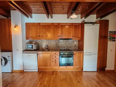 Una cocina o zona de cocina en Tu dúplex luminoso con vistas y confort - Erta 12