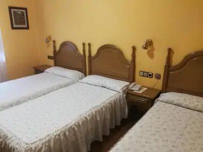 Cama o camas de una habitación en Hotel Xabier