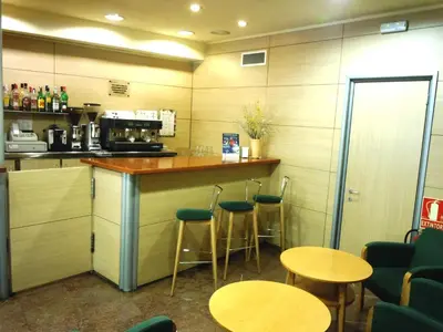 Una cocina o zona de cocina en Hotel Urogallo