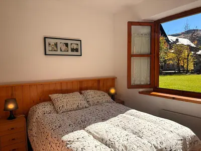 Cama o camas de una habitación en Tu rincón- Planta baja con jardín y parking - Dellui 2