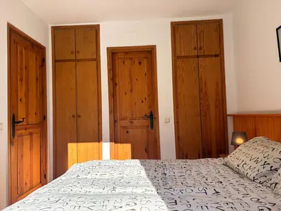 Cama o camas de una habitación en Tu rincón- Planta baja con jardín y parking - Dellui 2