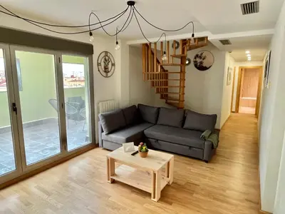 Zona de estar de Apartamento Vive Zaragoza IV