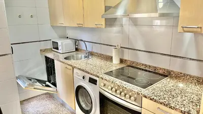 Una cocina o zona de cocina en Apartamento Vive Zaragoza IV