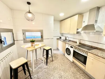 Una cocina o zona de cocina en Apartamento Vive Zaragoza IV