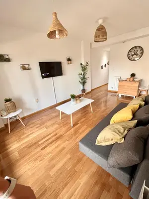 Una televisión o centro de entretenimiento en Apartamento Vive Zaragoza IV