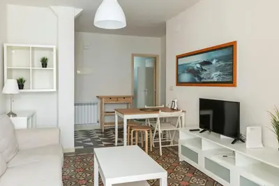 Una televisión o centro de entretenimiento en Apartamento CityCenter Tudela