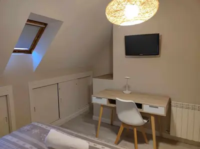 Una televisión o centro de entretenimiento en El Cambaz - tucasaenlospirineos