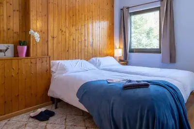 Cama o camas de una habitación en Tebarray ☆ Increíbles vistas, terraza y garaje · Pirineos360