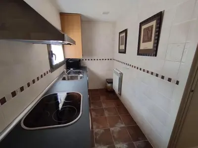 Una cocina o zona de cocina en Apartamento en Las margas Golf