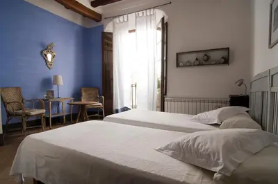 Cama o camas de una habitación en Cal Porrerà 1800