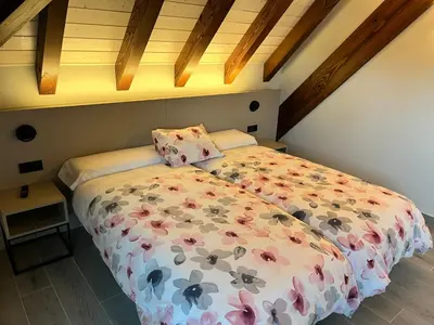 Cama o camas de una habitación en HOTEL RURAL BASQUE IRATI
