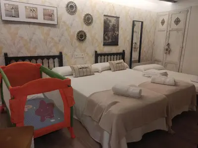 Cama o camas de una habitación en El Géiser de Pozuelo