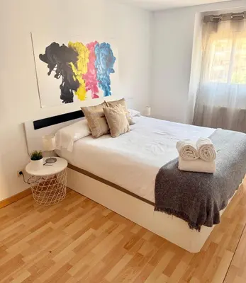 Cama o camas de una habitación en Apartamento Ramon Pignatelli