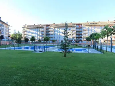 Piscina en o cerca de Precioso atico con bonitas vistas a la Peña Oroel