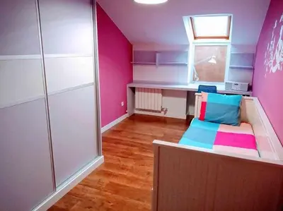 Cama o camas de una habitación en Precioso atico con bonitas vistas a la Peña Oroel