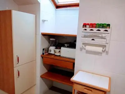 Una cocina o zona de cocina en Precioso atico con bonitas vistas a la Peña Oroel