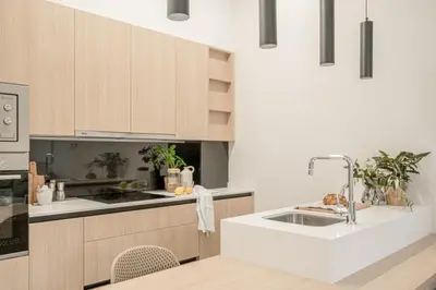 Una cocina o zona de cocina en Apartamentos Pamplona by Clabao