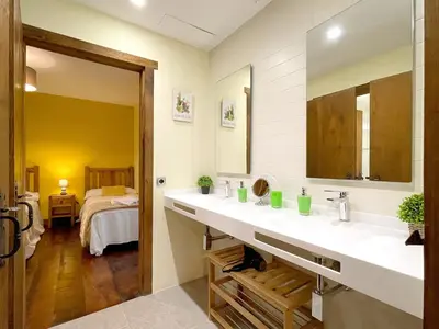 Cama o camas de una habitación en CASA RURAL ERVITENA