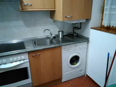 Una cocina o zona de cocina en Adosado con gran terraza
