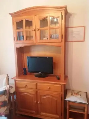 Una televisión o centro de entretenimiento en Adosado con gran terraza