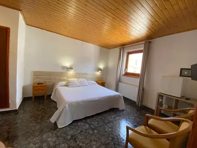 Cama o camas de una habitación en Hotel Rural Cal Amadeu