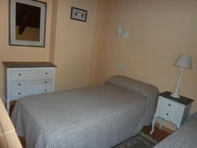 Cama o camas de una habitación en La buhardilla de Mayte