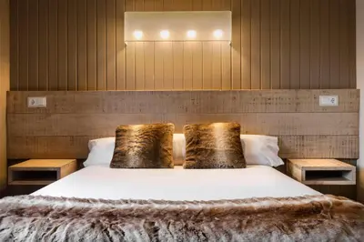 Cama o camas de una habitación en Hotel Tobazo