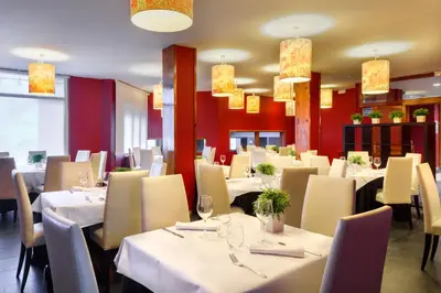 Un restaurante o sitio para comer en Hotel Tobazo