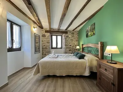 Cama o camas de una habitación en Casa Rural Sutegia