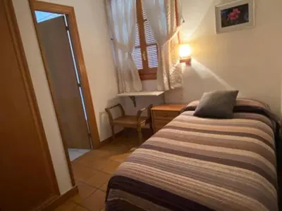 Cama o camas de una habitación en HOTEL LAMOGA