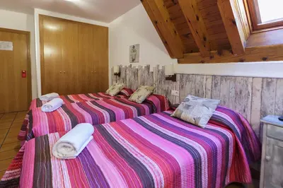 Cama o camas de una habitación en HOTEL LAMOGA