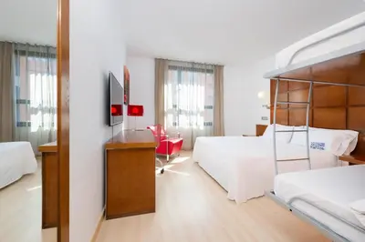 Cama o camas de una habitación en Hotel Zentral Ave