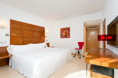 Cama o camas de una habitación en Hotel Zentral Ave