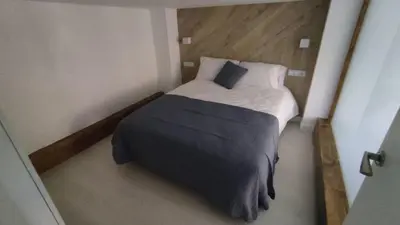 Cama o camas de una habitación en vivienda turística los Robles