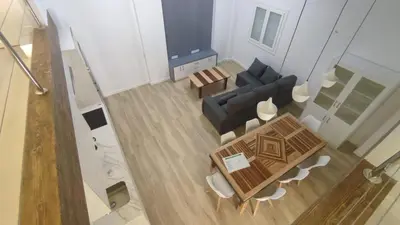 Zona de estar de vivienda turística los Robles