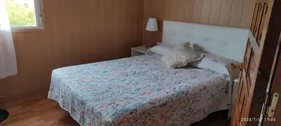 Cama o camas de una habitación en Habitaciones en planta superior independiente con piscina - barbacoa