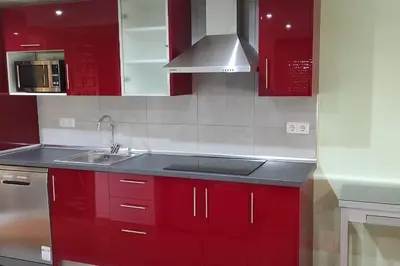 Una cocina o zona de cocina en Habitaciones en planta superior independiente con piscina - barbacoa