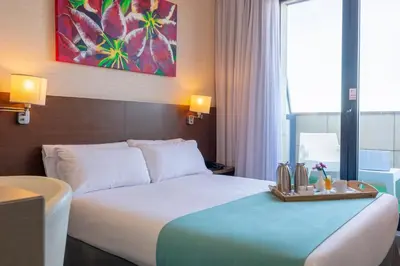 Cama o camas de una habitación en Hotel & Spa Real Ciudad De Zaragoza