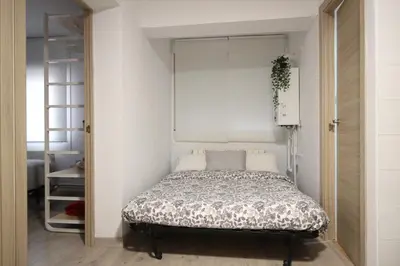 Cama o camas de una habitación en Apartamento los Pirineos Sabi
