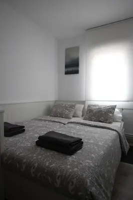 Cama o camas de una habitación en Apartamento los Pirineos Sabi